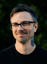 A headshot of Joshua S. Porter
