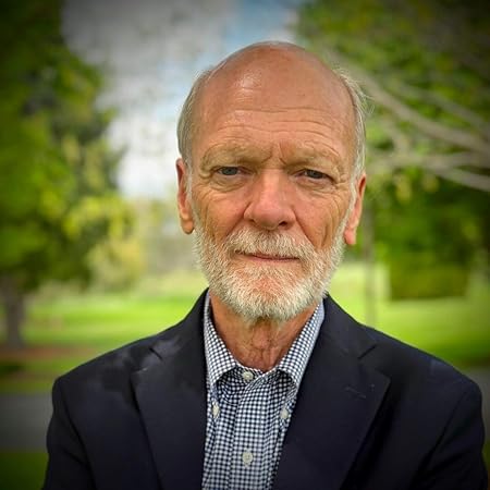 A headshot of Ken Isaacs