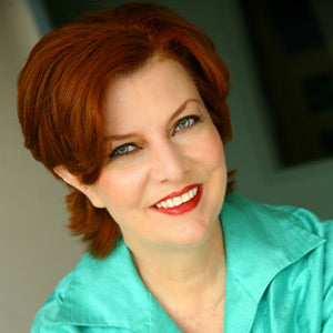A headshot of Angela Elwell Hunt